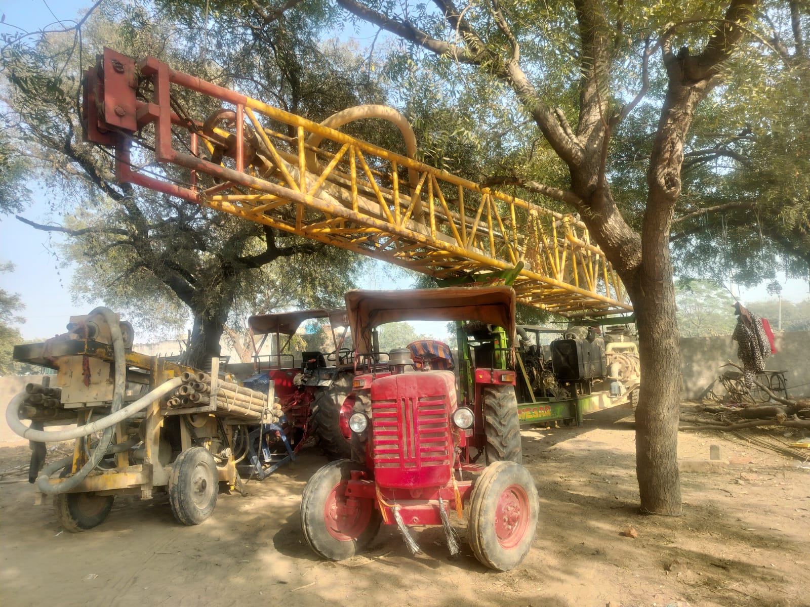 Drill rig boring a new borehole