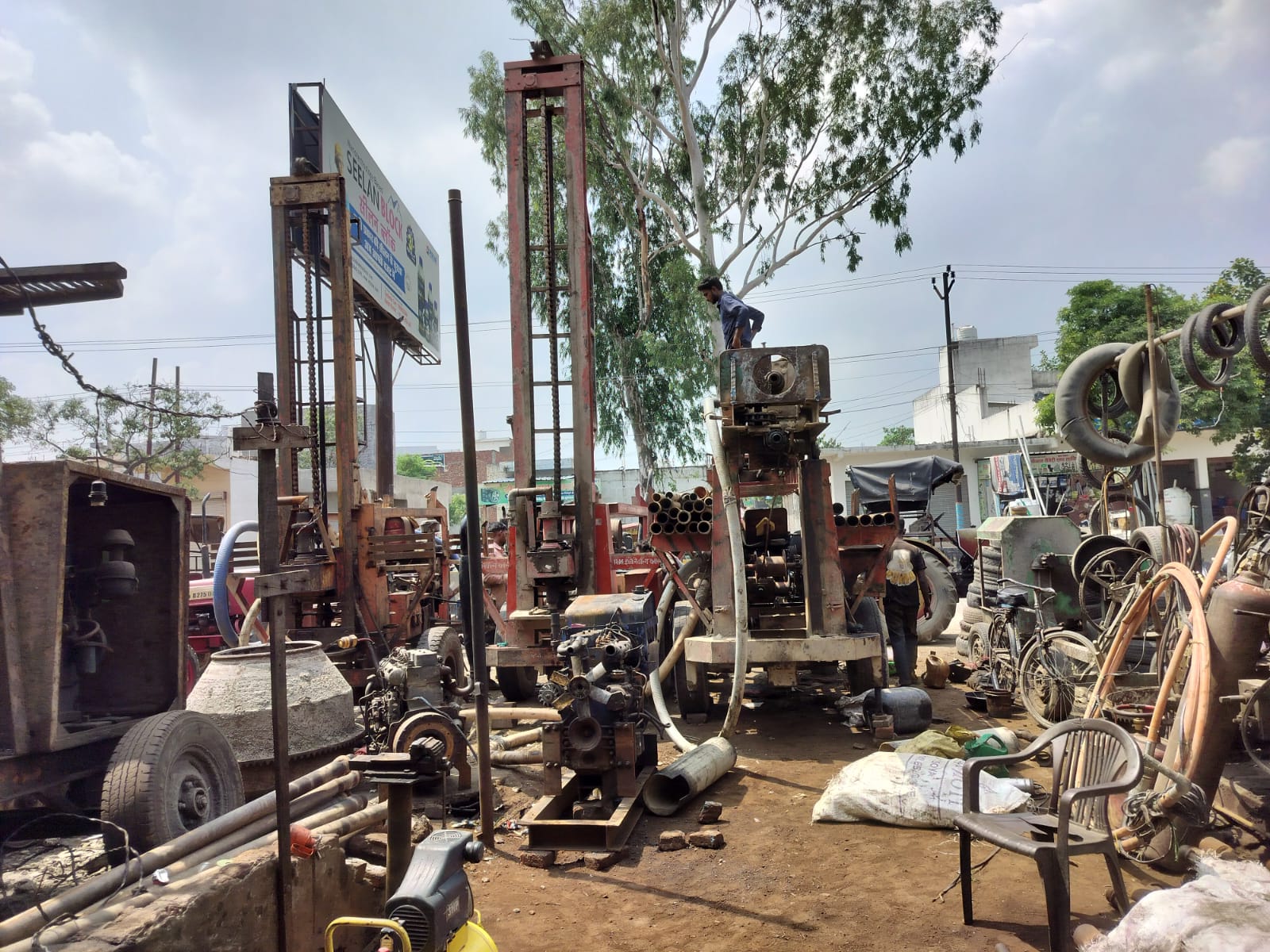 Drill rig boring a new borehole
